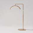 Manufakturo Beauty LED Rotating Head Treatment Lamp - Adjustable Colour Temp Brown Gold - LED treatment lamp with adjustable light arms on a white background