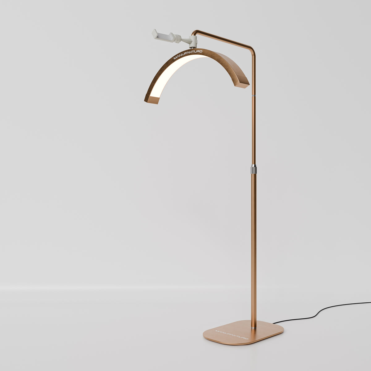 Manufakturo Beauty LED Rotating Head Treatment Lamp - Adjustable Colour Temp Brown Gold - LED treatment lamp with adjustable light arms on a white background