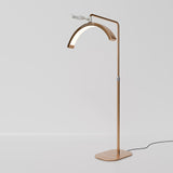 Manufakturo Beauty LED Rotating Head Treatment Lamp - Adjustable Colour Temp Brown Gold - LED treatment lamp with adjustable light arms on a white background