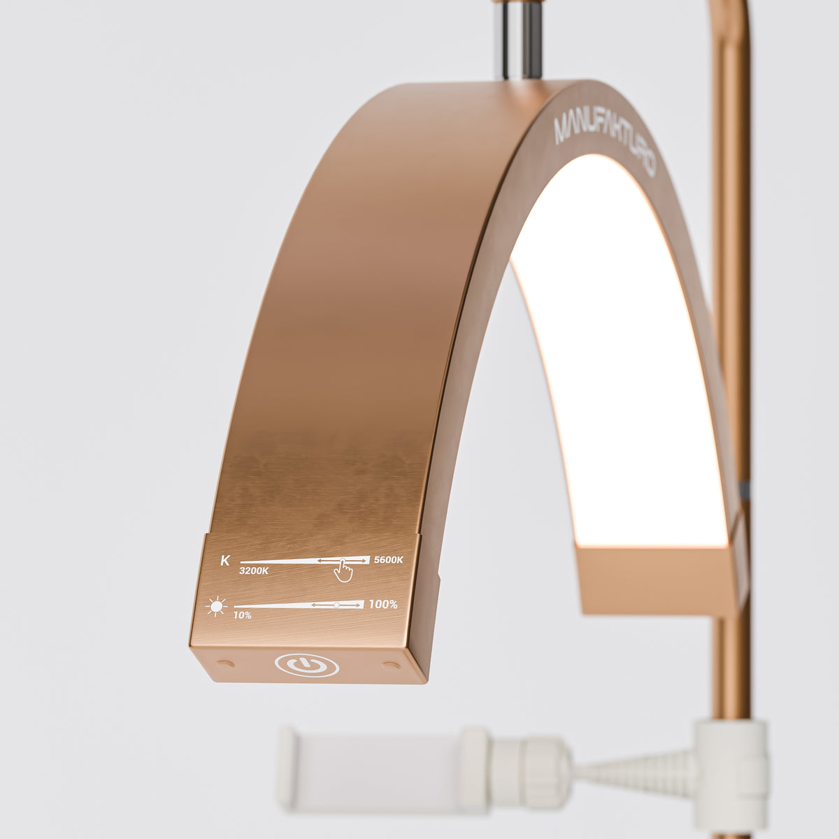 Manufakturo Beauty LED Rotating Head Treatment Lamp - Adjustable Colour Temp Brown Gold - LED treatment lamp with adjustable light arms on a white background