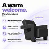 Manufakturo Lenné Black reception chair features: high-density cushioning, padded armrests, faux-leather upholstery, plywood construction and contrast stitching.