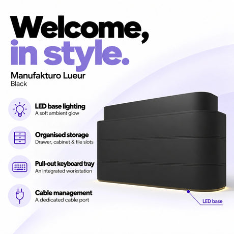 Manufakturo Lueur Black reception desk with LED base lighting, organised drawer, cabinet and file storage, a pull-out keyboard tray and dedicated cable port.