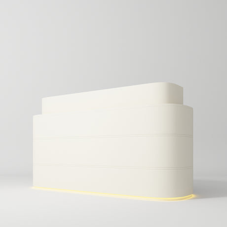 Manufakturo Lueur Premium Reception Desk for Luxury Beauty Salon with LED Base Creamy - displayed in a professional treatment-room setting