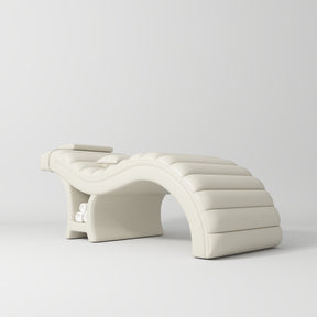 Manufakturo Luxe Eyelash Bed - Contoured Spa Couch with Towel Storage Creamy - displayed in a professional treatment-room setting