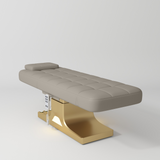 Manufakturo Saphir version A Luxury Electric Lash Beauty Bed - Hand & Foot Controls Stone Taupe - close-up of the upholstery and construction details
