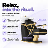 Manufakturo Maison Black backwash unit with a white tilting ceramic basin, hot and cold mixer, hand shower and cushioned seating.