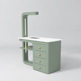 Three-quarter view of the Manufakturo ManiMuse Olive manicure desk with a white stone top, dust collector and four drawers.