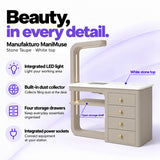 Manufakturo ManiMuse Stone Taupe manicure desk with integrated LED light, built-in dust collector, four storage drawers and power sockets.
