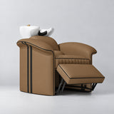 Manufakturo Monaco Caramel backwash unit with white basin and extended electric leg rest, viewed from the front at an angle.