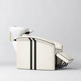 Manufakturo Monaco Creamy backwash unit with white basin and extended electric leg rest, shown from a low side angle.