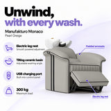 Manufakturo Monaco Pearl Greige backwash unit with electric leg rest, tilting ceramic basin, USB charging port and 300 kg maximum load.