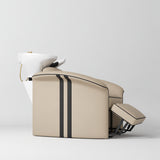 Manufakturo Monaco Warm Beige backwash unit with white basin and extended electric leg rest, shown from a low side angle.