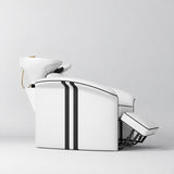 Manufakturo Monaco White backwash unit with white basin and extended electric leg rest, shown from a low side angle.