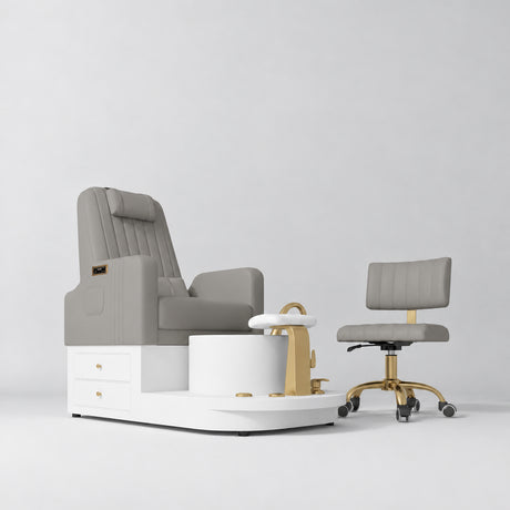 Manufakturo Noémie Pearl Greige two-piece pedicure set with electric massage chair, gold tap, smooth foot support and matching rolling stool.