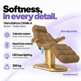Manufakturo Orielle A Brown teddy electric beauty bed features: 3 motors, hand and foot controls, LED base lighting, 300 kg maximum load, removable armrests and extendable footrest.
