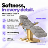 Manufakturo Orielle A Grey teddy electric beauty bed features: 3 motors, hand and foot controls, LED base lighting, 300 kg maximum load, removable armrests and extendable footrest.