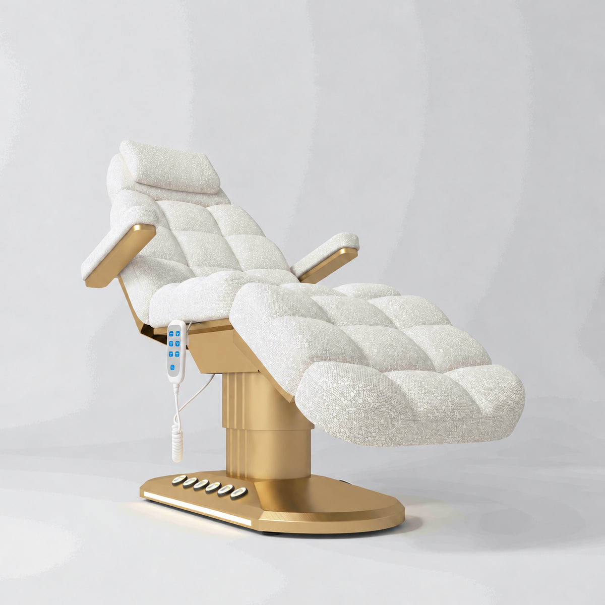 Manufakturo Orielle A White teddy electric beauty bed with gold oval base and current hand-held controller.