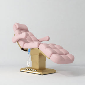 Manufakturo Orielle B Bare Blush electric beauty bed with gold base and current hand-held controller.