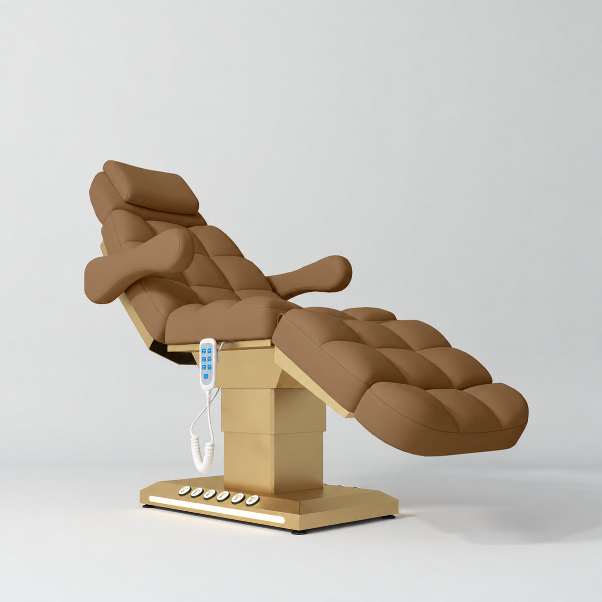 Manufakturo Orielle B Caramel electric beauty bed with gold base and current hand-held controller.