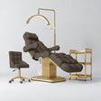 Manufakturo Orielle B Cocoa Mocha four-piece beauty studio set with Noblesse chair, V3 Pro Gold treatment lamp, empty gold trolley and current hand control.
