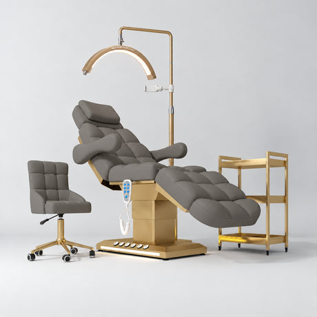Manufakturo Orielle B Deep Ash four-piece beauty studio set with Noblesse chair, V3 Pro Gold treatment lamp, empty gold trolley and current hand control.