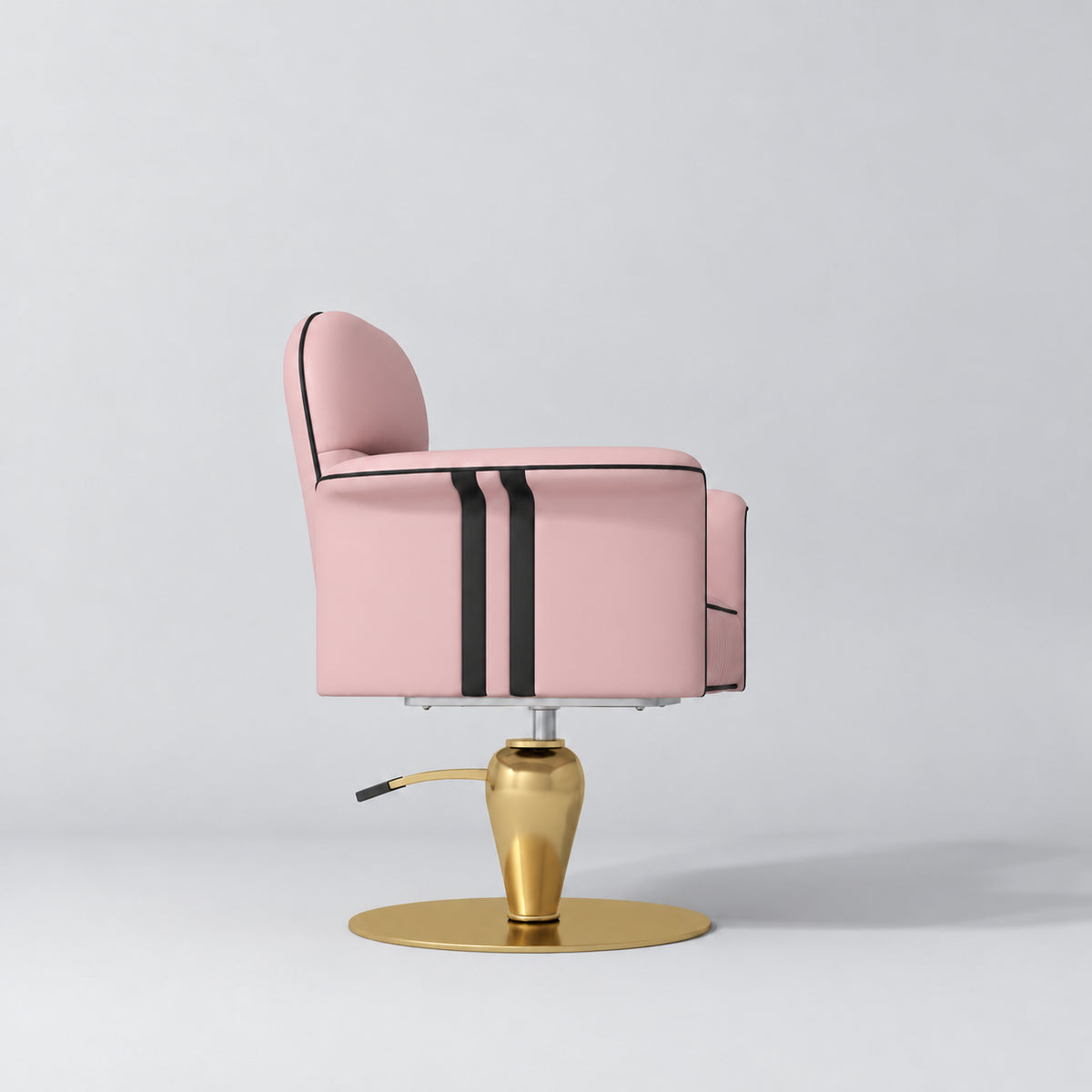 Side view of the Manufakturo Palais styling chair in Bare Blush with black piping and a gold pedestal base, on a grey studio background.