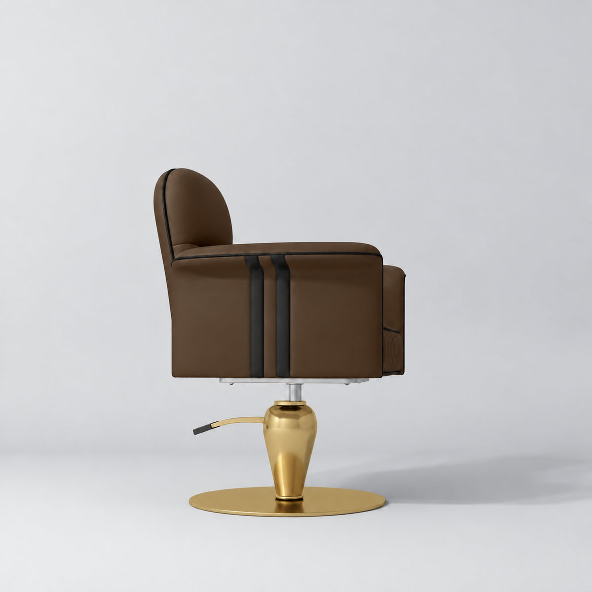 Side view of the Manufakturo Palais styling chair in Cocoa Mocha with black piping and a gold pedestal base, on a grey studio background.