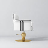 Side view of the Manufakturo Palais styling chair in White with black piping and a gold pedestal base, on a grey studio background.
