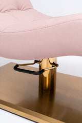 Manufakturo Prestige Bare Blush close-up of upholstered stitching, gold hydraulic column and black foot pedal.