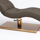 Manufakturo Prestige Cocoa Mocha upholstered bed close-up with gold hydraulic pump, black foot pedal and rectangular gold base.