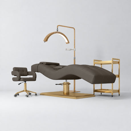 Manufakturo Prestige Cocoa Mocha studio set with hydraulic lash bed, Serenity chair, V3 Pro Gold lamp and empty gold trolley.