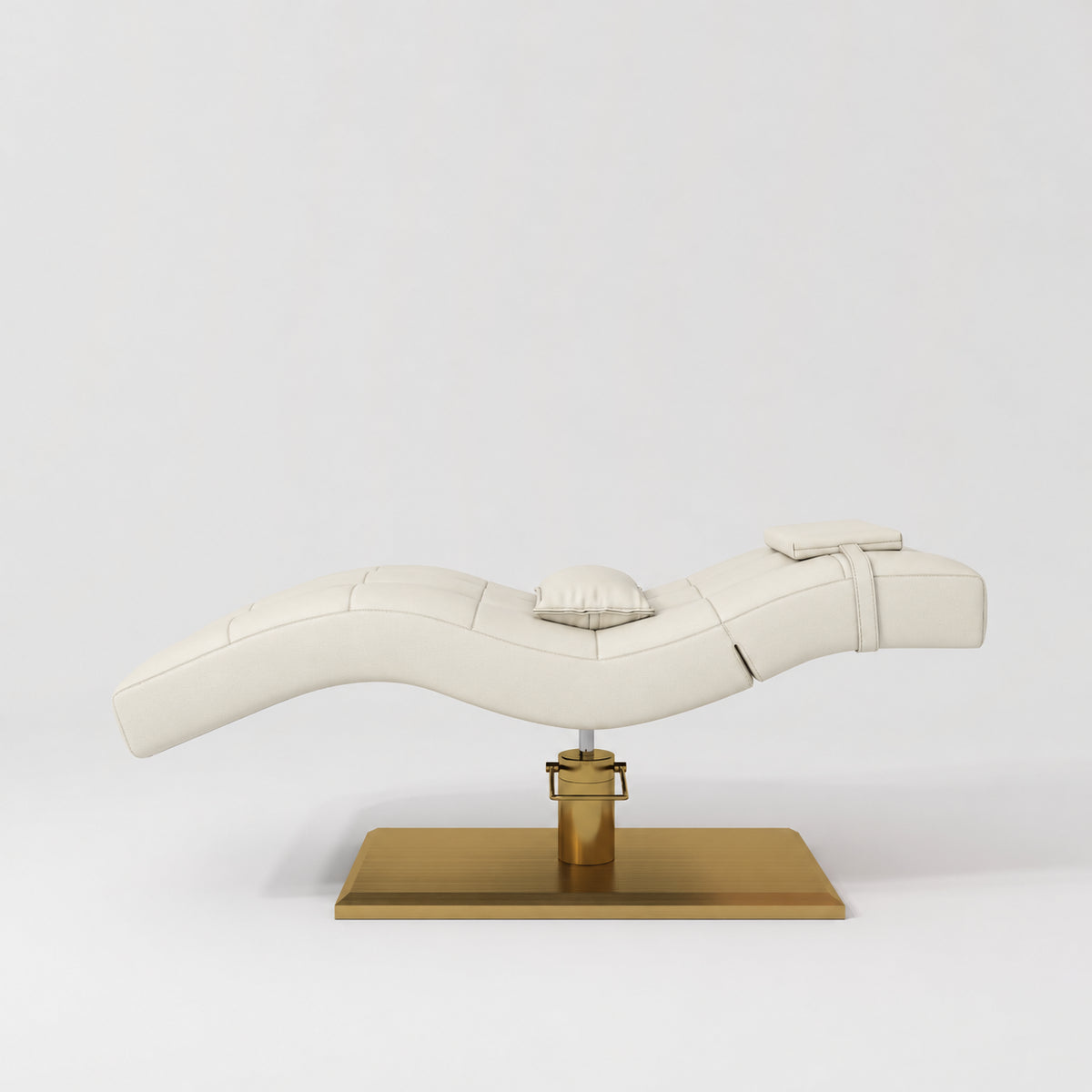 Manufakturo Prestige Creamy hydraulic eyelash bed, side elevation showing head and lumbar pillows and gold base.