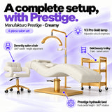 Manufakturo Prestige Creamy four-piece salon set features: hydraulic bed, Serenity chair, V3 Pro Gold lamp and gold trolley.