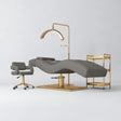 Manufakturo Prestige Deep Ash studio set with hydraulic lash bed, Serenity chair, V3 Pro Gold lamp and empty gold trolley.