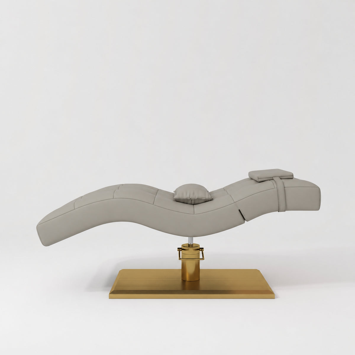 Manufakturo Prestige Pearl Greige hydraulic eyelash bed, side elevation showing head and lumbar pillows and gold base.
