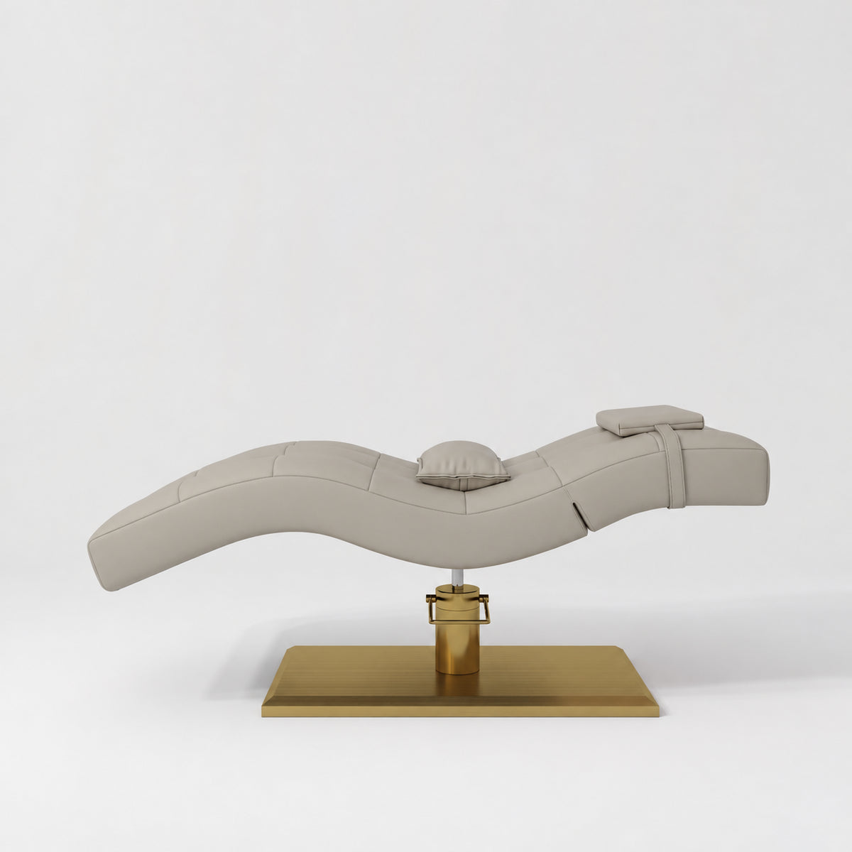 Manufakturo Prestige Stone Taupe hydraulic eyelash bed, side elevation showing head and lumbar pillows and gold base.