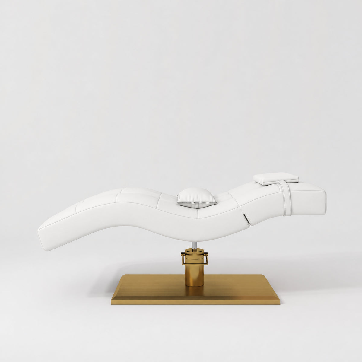 Manufakturo Prestige White hydraulic eyelash bed, side elevation showing head and lumbar pillows and gold base.