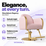 Manufakturo Regency Bare Blush styling chair with foot-operated hydraulic height adjustment, swivel and locking control, padded armrests, integrated metal footrest, curved backrest and gold-finished base.