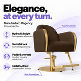 Manufakturo Regency Cocoa Mocha styling chair with foot-operated hydraulic height adjustment, swivel and locking control, padded armrests, integrated metal footrest, curved backrest and gold-finished base.