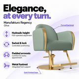 Manufakturo Regency Olive styling chair with foot-operated hydraulic height adjustment, swivel and locking control, padded armrests, integrated metal footrest, curved backrest and gold-finished base.