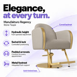 Manufakturo Regency Stone Taupe styling chair with foot-operated hydraulic height adjustment, swivel and locking control, padded armrests, integrated metal footrest, curved backrest and gold-finished base.
