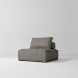 Manufakturo Rhéa Luxury Boutique Sofa with Soft Upholstery for Salon Waiting Area Deep Ash - product displayed with its packaging on a dark background