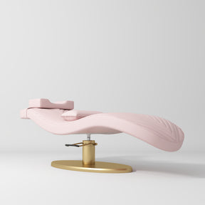 Manufakturo Royale Luxury & Ergonomic Beauty Lash Bed Gold Base Light Pink - displayed in a professional treatment-room setting