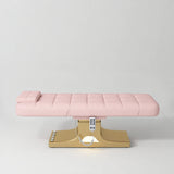 Manufakturo Saphir A Light Pink electric beauty bed with gold base, flat lying position shown from the side, without armrests.