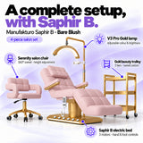 Manufakturo Saphir B Bare Blush set features: three-motor bed with hand and foot controls, Serenity swivel chair, adjustable V3 Pro Gold lamp and three-tier gold trolley.