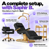 Manufakturo Saphir B Black set features: three-motor bed with hand and foot controls, Serenity swivel chair, adjustable V3 Pro Gold lamp and three-tier gold trolley.