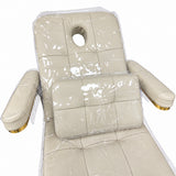 Saphir B clear backrest protector with the face aperture open and the covered cushion resting on the seat