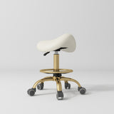 Manufakturo Selle Ergonomic Beauty Saddle Stool Creamy - Gold Base - close-up of the upholstery and construction details