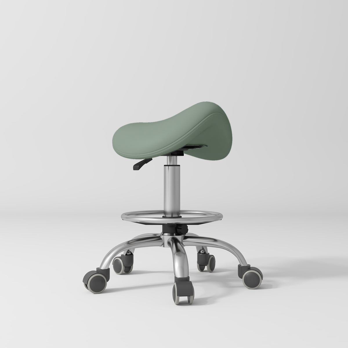 Manufakturo Selle Ergonomic Beauty Saddle Stool Olive - Silver Base - displayed in a professional treatment-room setting
