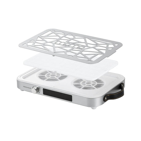 Momo P35 nail dust collector with the metal grille and pleated filter lifted to reveal two fans